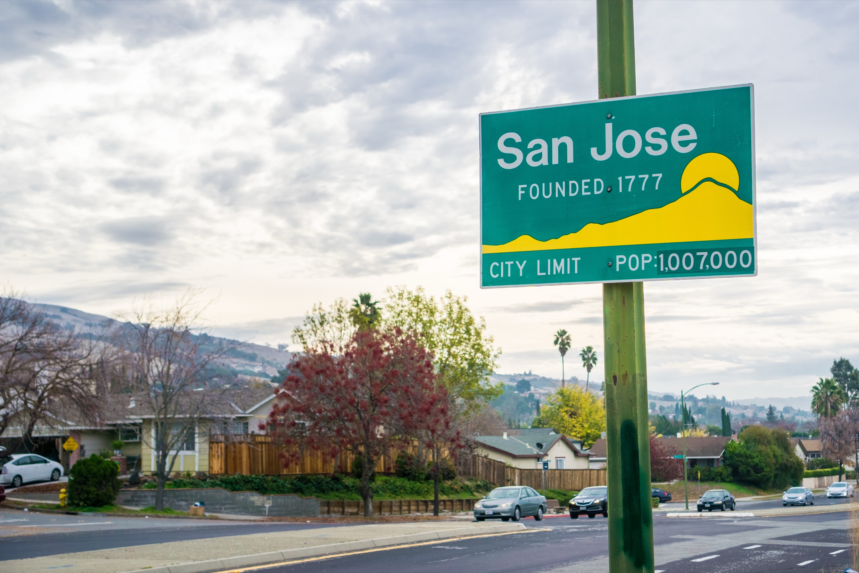 Hiking trail through verdant green hills near San Jose California with panoramic views