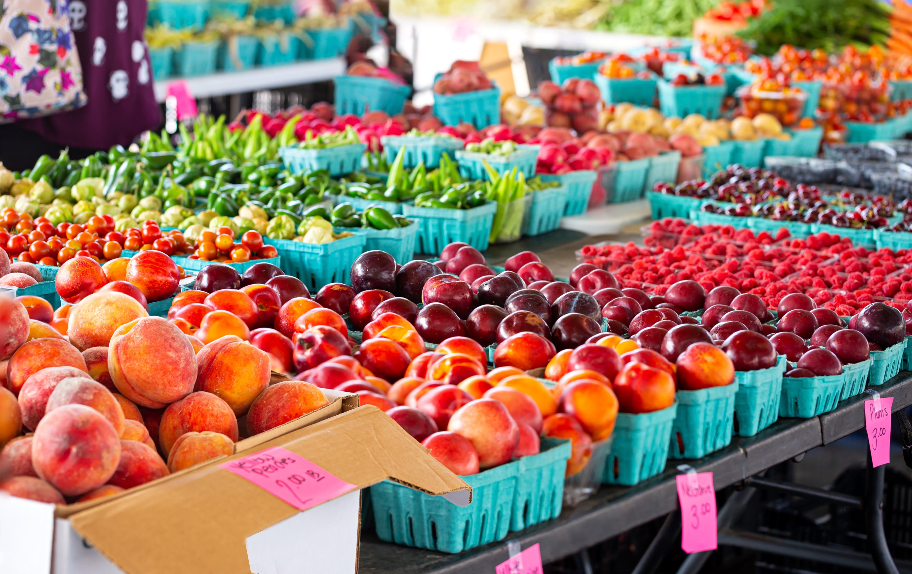 Variety of fruit and vegetables at a community outdoor market