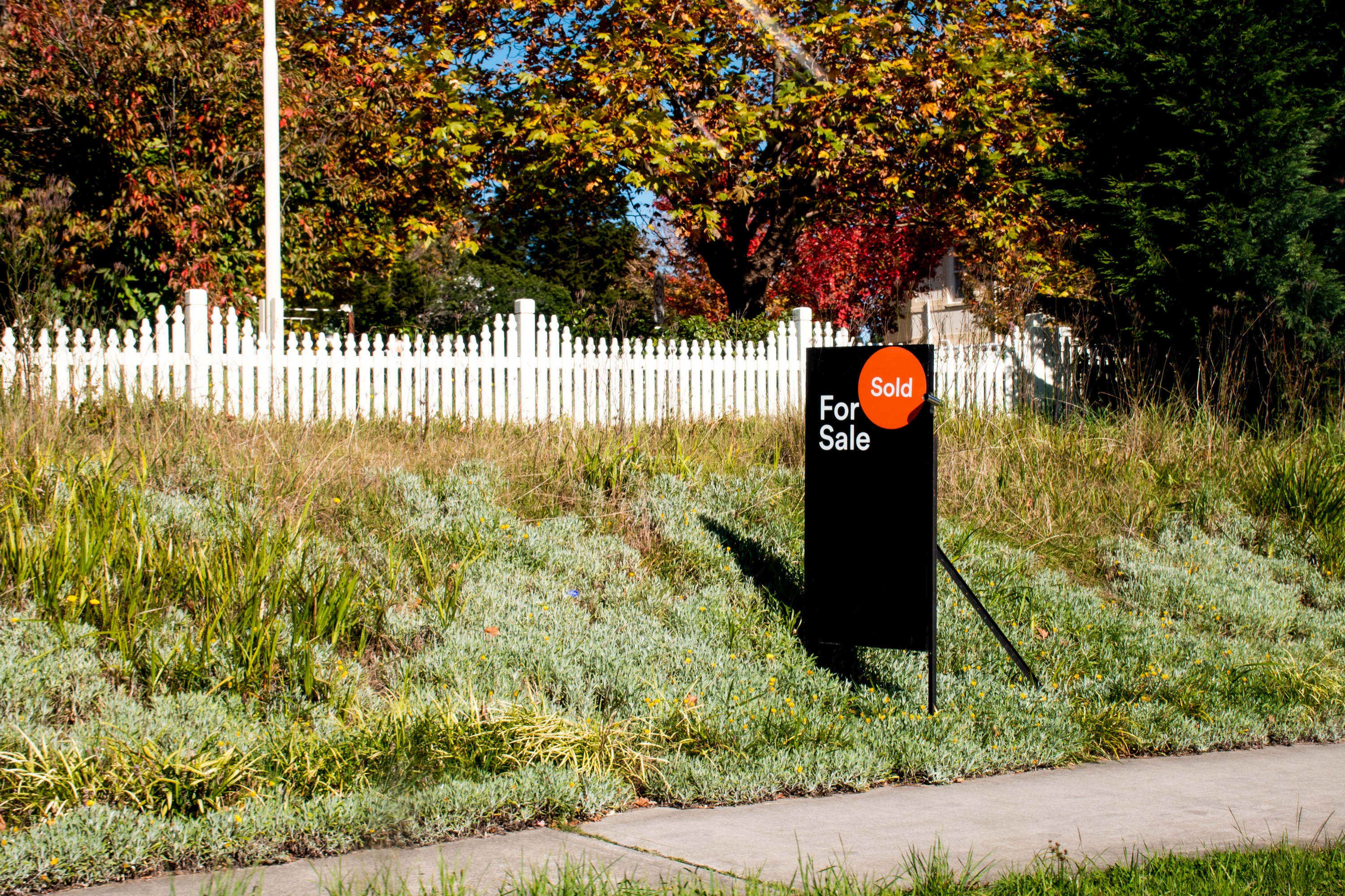 For sale sign with a SOLD sticker in front of a Santa Clara County home