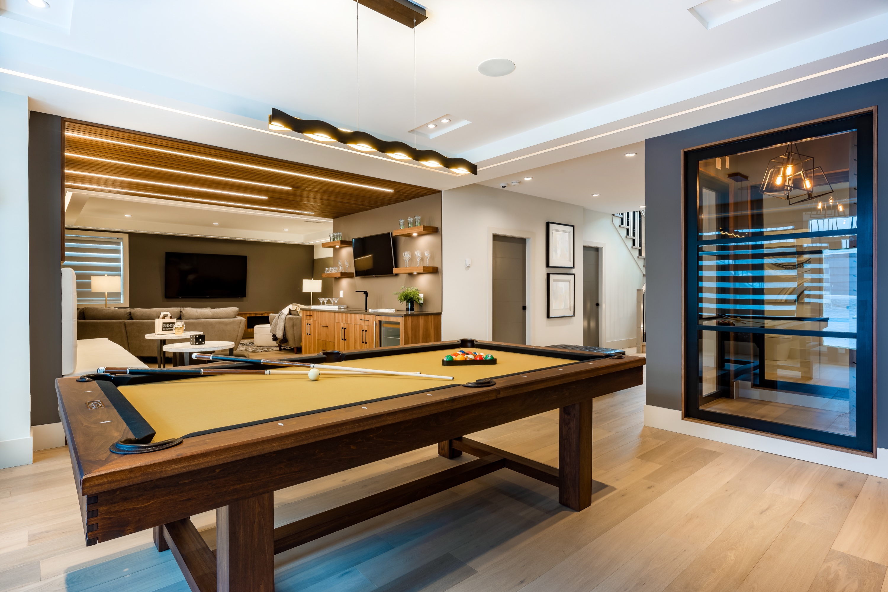 Bright open-concept kitchen and living area prepared and staged for fall showings