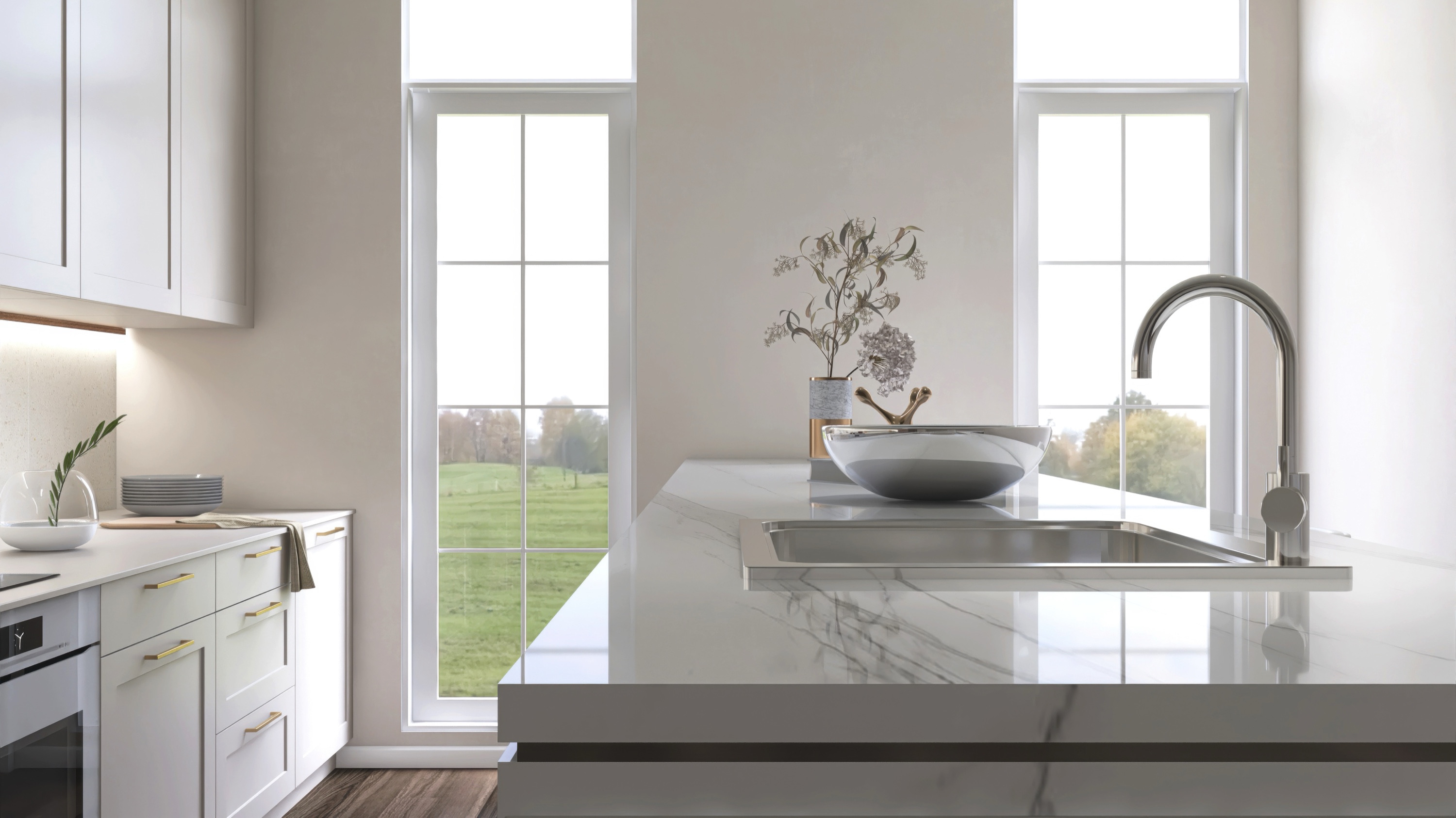 Marble kitchen island in a modern luxury kitchen with custom cabinetry